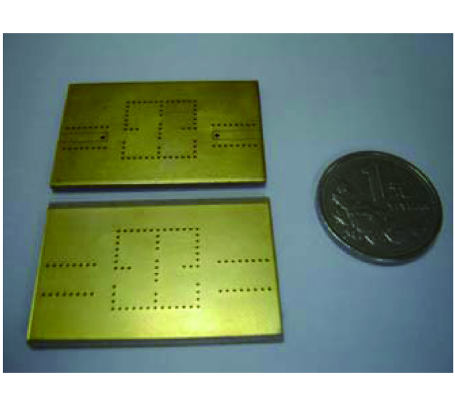 COMPACT FOLDED SUBSTRATE INTEGRATED WAVEGUIDE CAVITIES AND BANDPASS FILTER