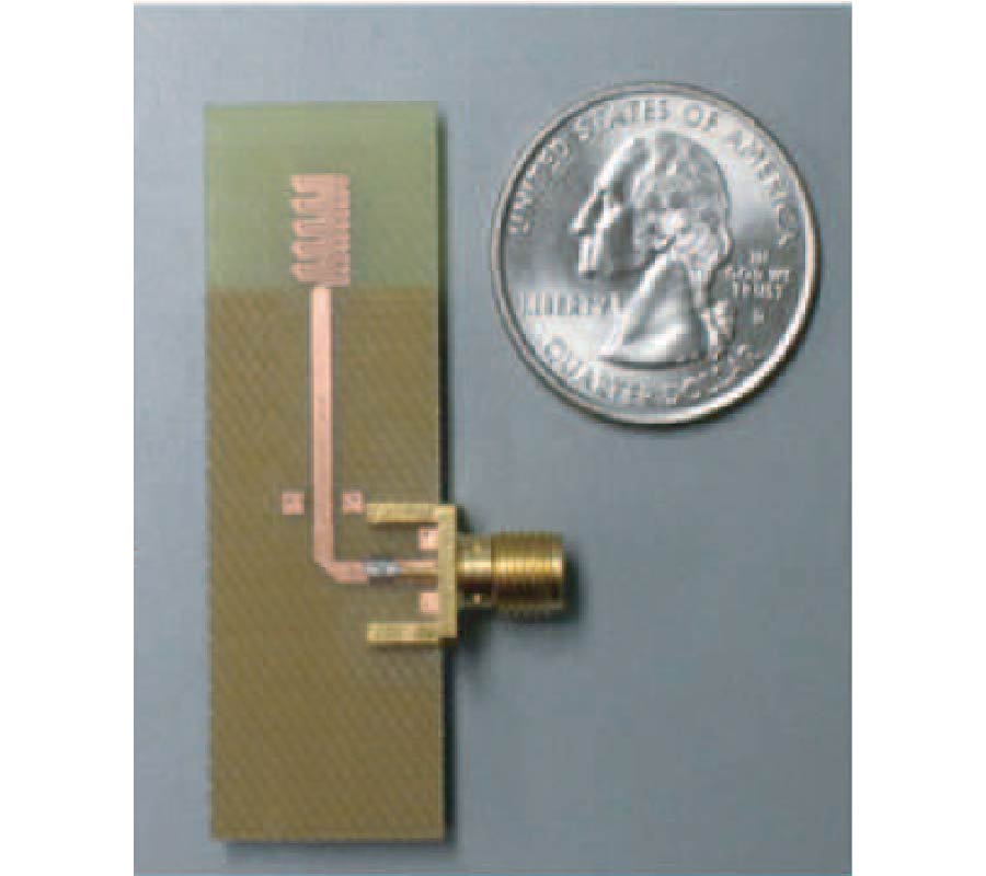 A WIDEBAND MINIATURIZED DIPOLE ANTENNA ON A PRINTED CIRCUIT BOARD