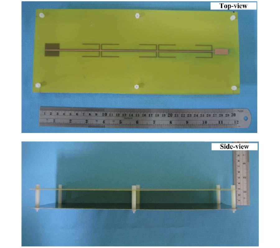 HIGH PERFORMANCE PLANAR SLEEVE DIPOLE ARRAY ANTENNA WITH DIRECTIONAL RADIATION