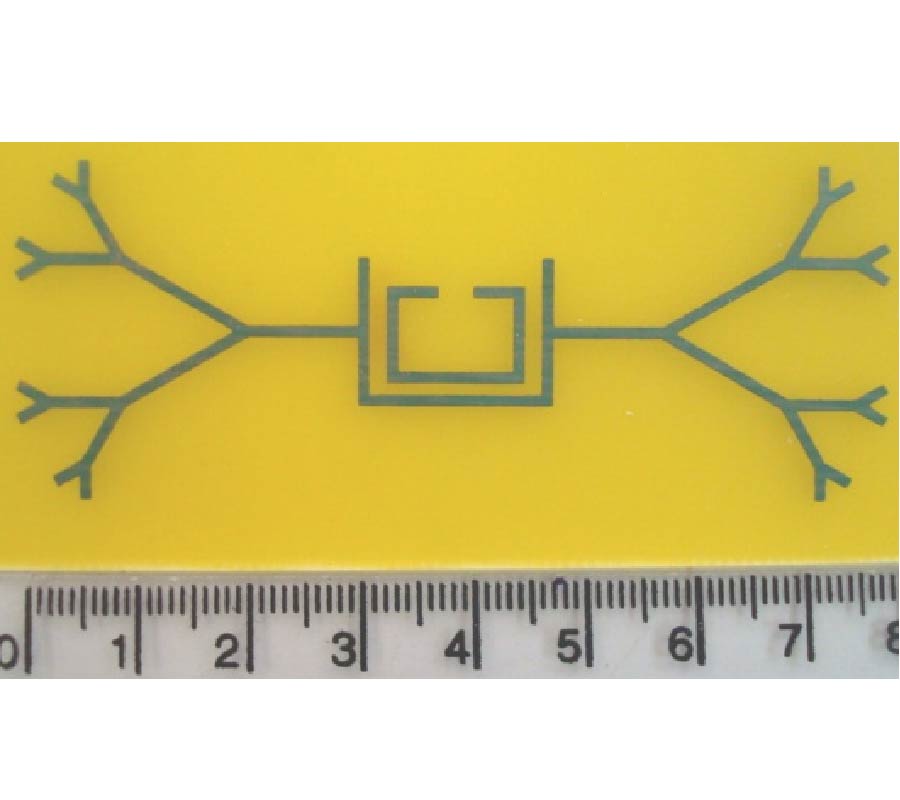 A COMPACT FRACTAL DIPOLE ANTENNA FOR 915MHz AND 2.4GHz RFID TAG APPLICATIONS