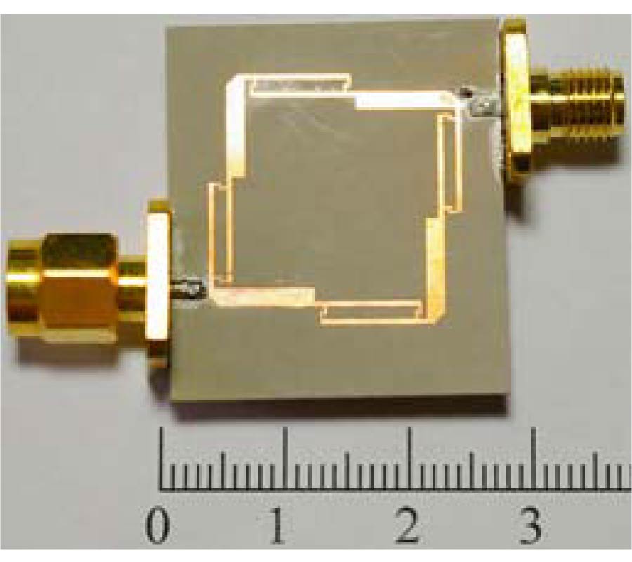 NEW DUAL-BAND BANDPASS FILTER WITH WIDE UPPER REJECTION BAND