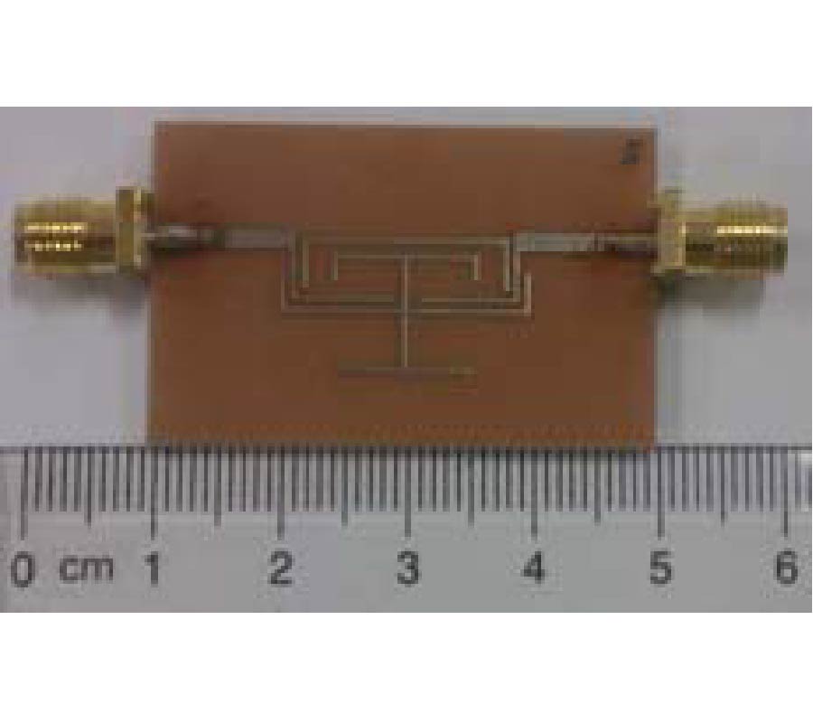 DESIGN AND IMPLEMENTATION OF COMPACT HYBRID FOUR-MODE BANDPASS FILTER WITH MULTI-TRANSMISSION ZEROS