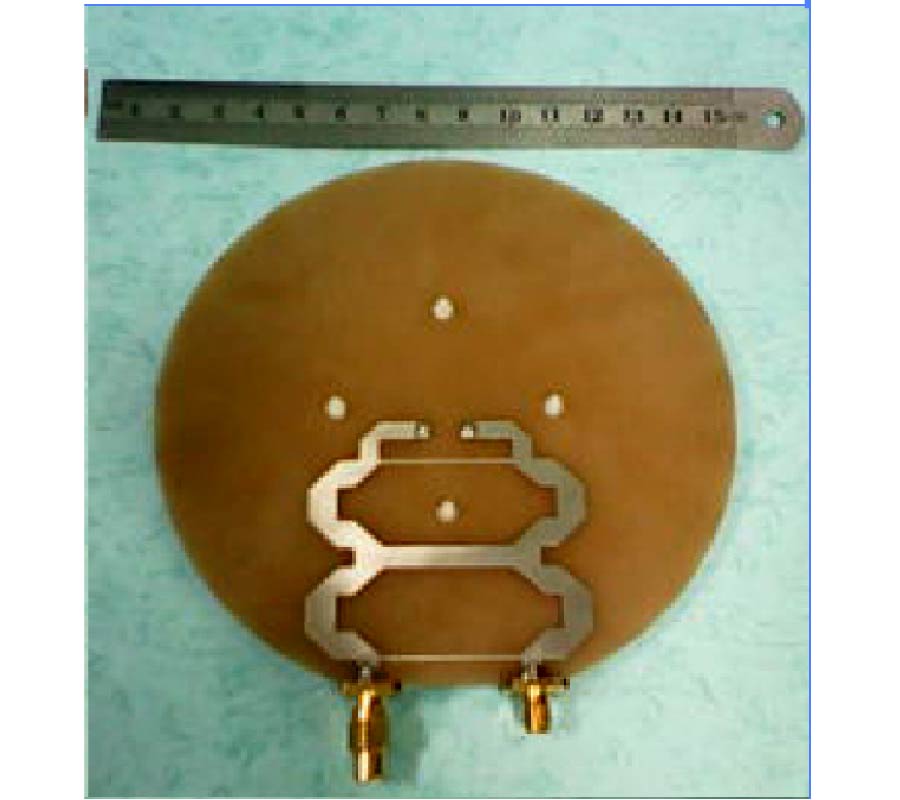 DUAL-BAND CIRCULARLY POLARIZED ANTENNA WITH LOW WIDE-ANGLE AXIAL-RATIO FOR TRI-BAND GPS APPLICATIONS