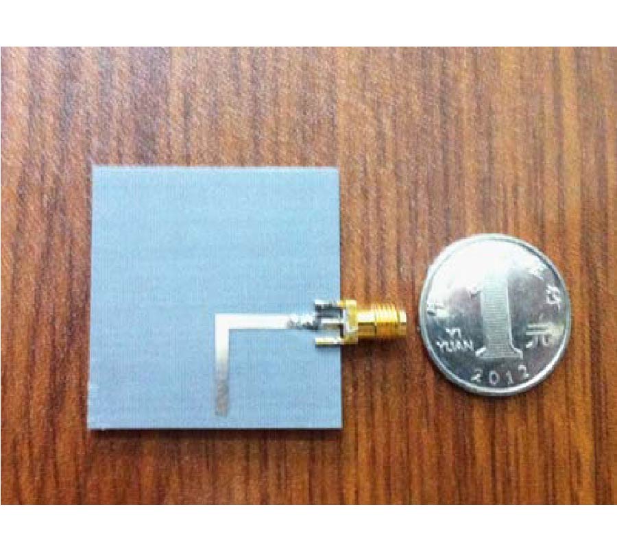 A COMPACT FREQUENCY RECONFIGURABLE UNEQUAL U-SLOT ANTENNA WITH A WIDE TUNABILITY RANGE