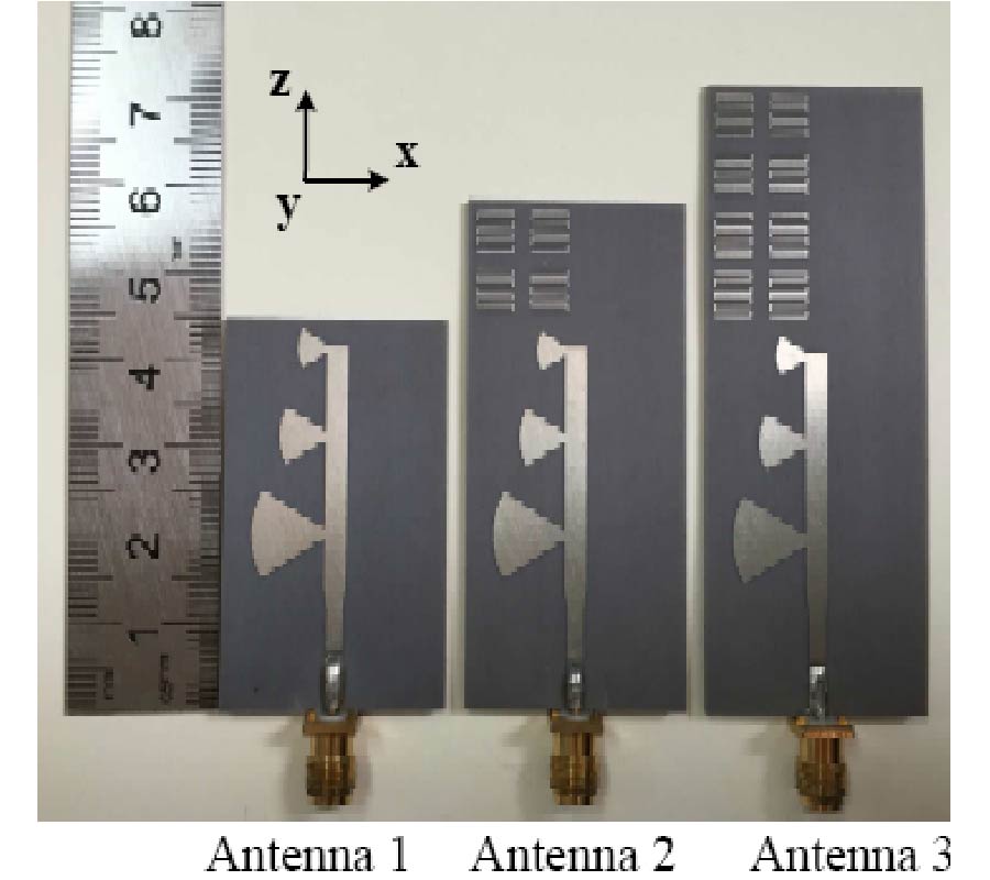 MEANDER-LINE BASED BROADBAND ARTIFICIAL MATERIAL FOR ENHANCING THE GAIN OF PRINTED END-FIRE ANTENNA