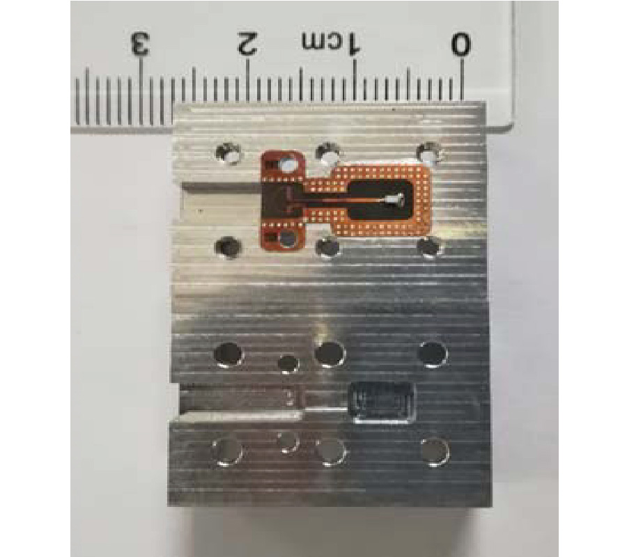 A BROADBAND MICROSTRIP-TO-WAVEGUIDE END-WALL PROBE TRANSITION AND ITS APPLICATION IN WAVEGUIDE TERMINATION