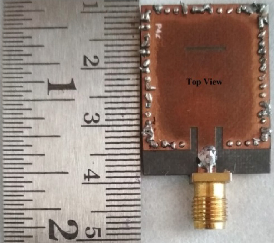 WIDEBAND LOW-PROFILE SIW CAVITY-BACKED BILATERAL SLOTS ANTENNA FOR X-BAND APPLICATION