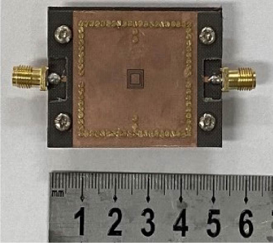A NOVEL DGS-BASED SUBSTRATE INTEGRATED COAXIAL LINE BANDPASS FILTER WITH THREE TRANSMISSION ZEROS