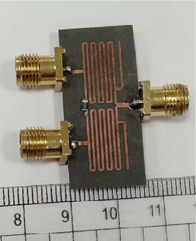 A Miniaturized Wideband Wilkinson Power Divider for IoT sub-GHz Applications